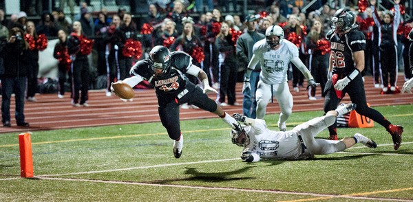 Butler III soars across the pylon in the 51-13 handling of Urbana round two of the playoffs. Photo courtesy of The Frederick News-Post.